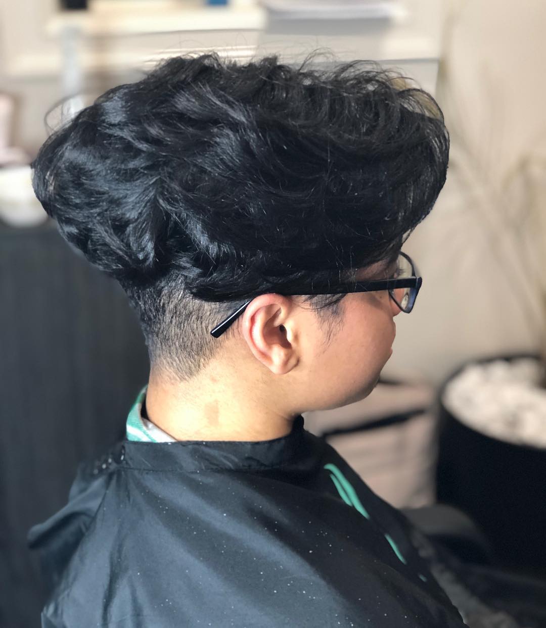 Glossy black tapered cut and silk press by Gifted Hands Beauty Bar
